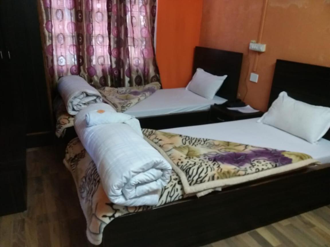 Vamoose Buddha Hotel Тауанг Екстериор снимка
